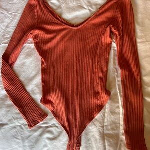 Beautiful coral ribbed long sleeve body suit size small